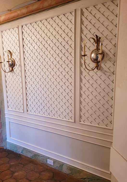 Lattice wall paneling wainscot in hall way 