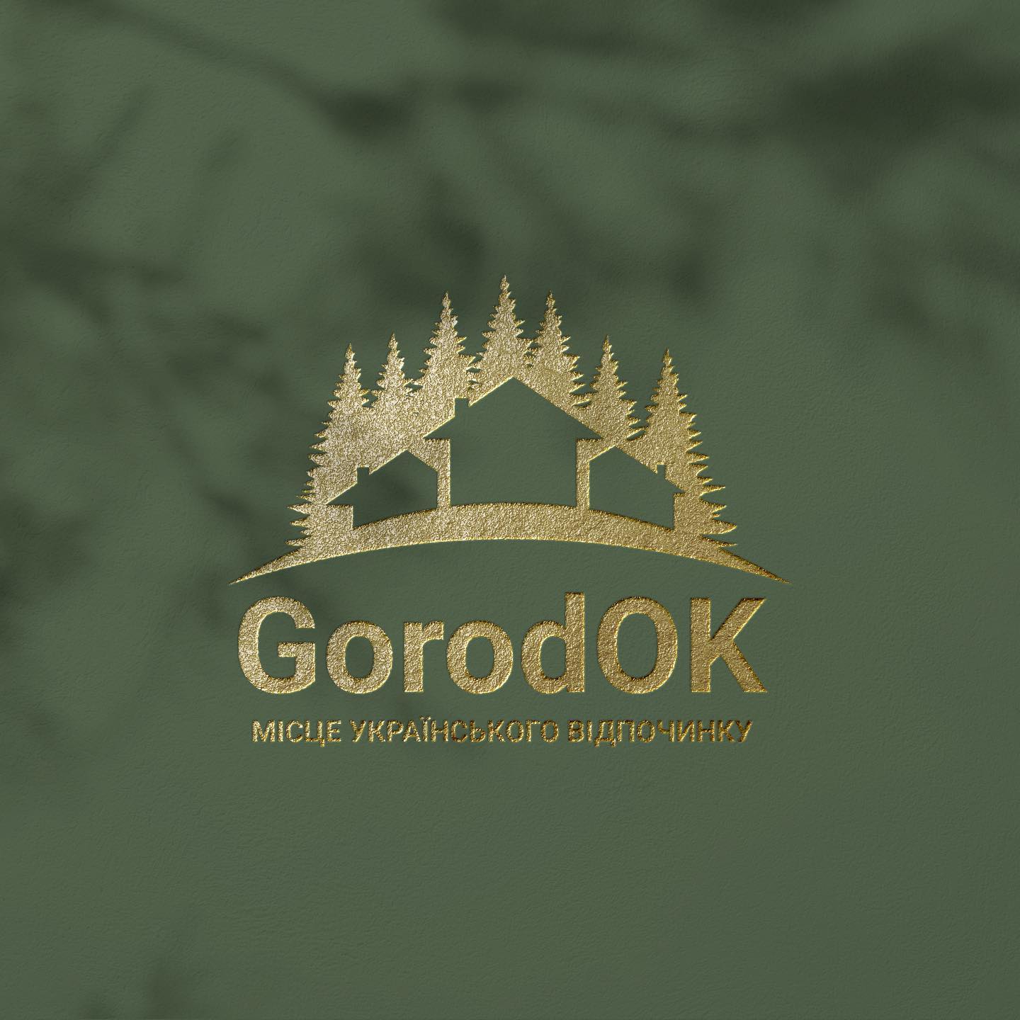 Gold GorodOK logo on green