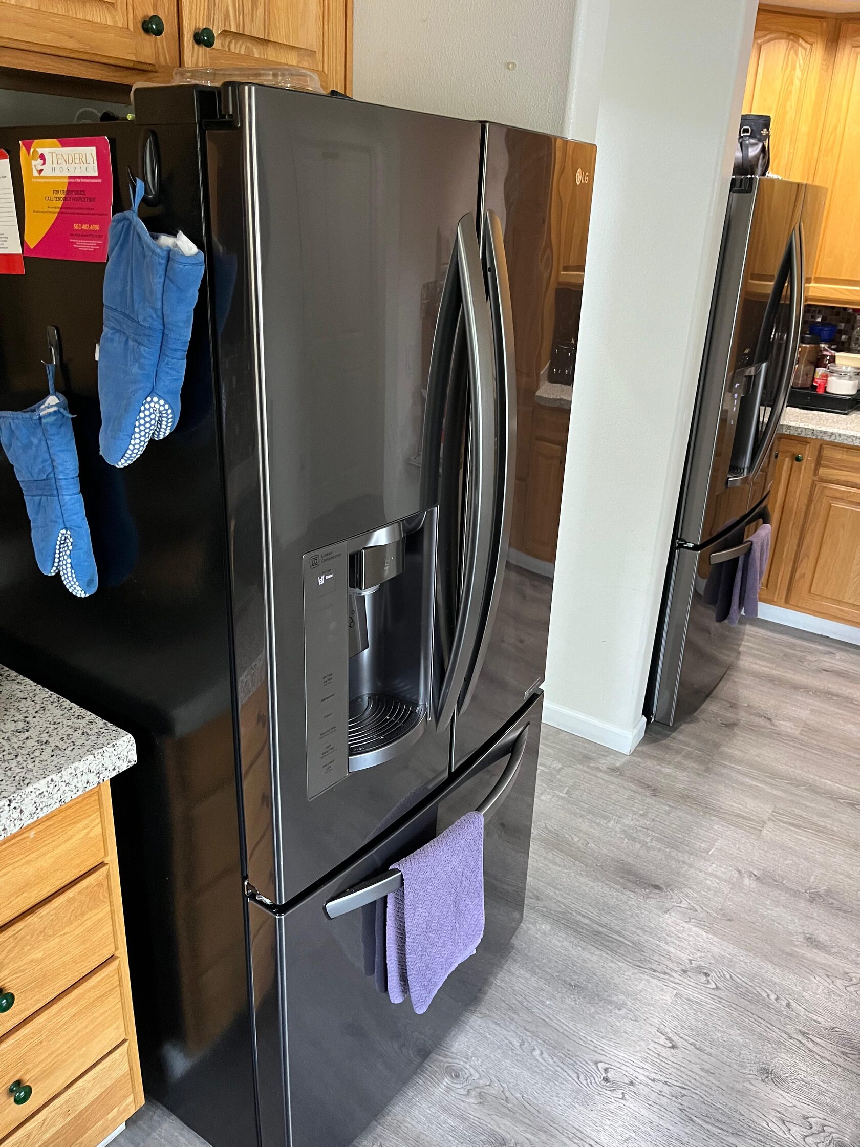 Black stainless refrigerator leak repair in St Johns, Portland Oregon