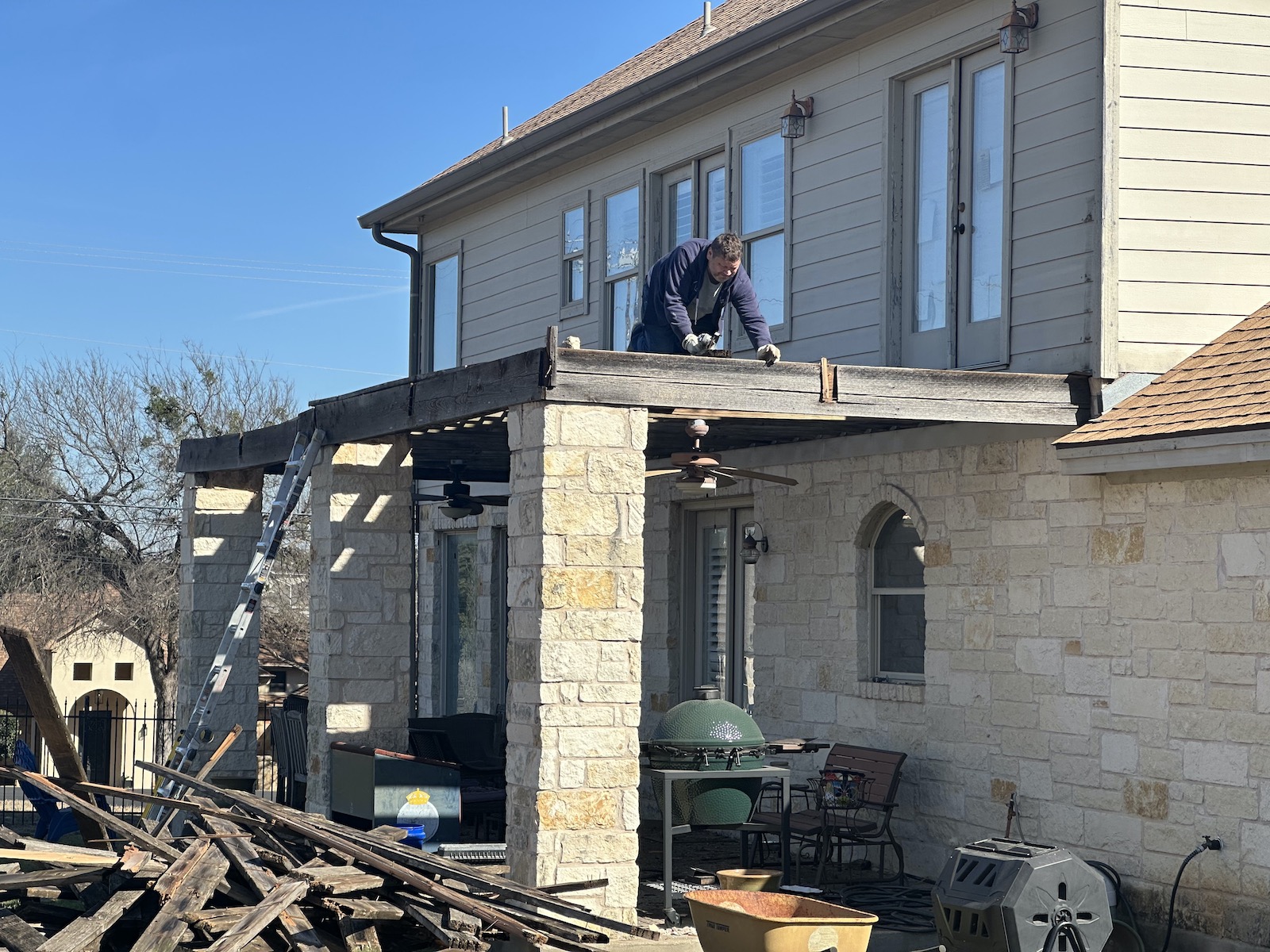 Second-story deck before — rot, failing framing, unsafe structure
