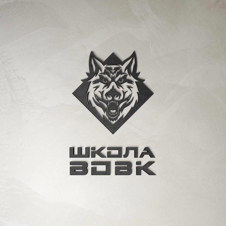 VOVK Combat Hopak School logo – a wolf's head against a rhombus