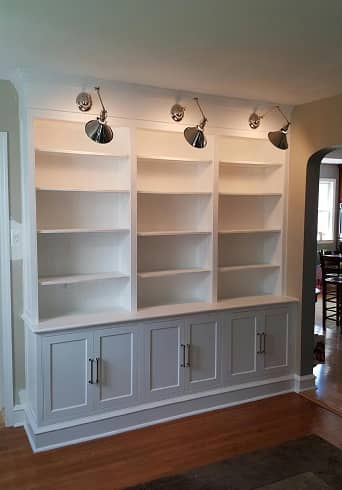 Living room white color display cabinet with decorative spot lights 