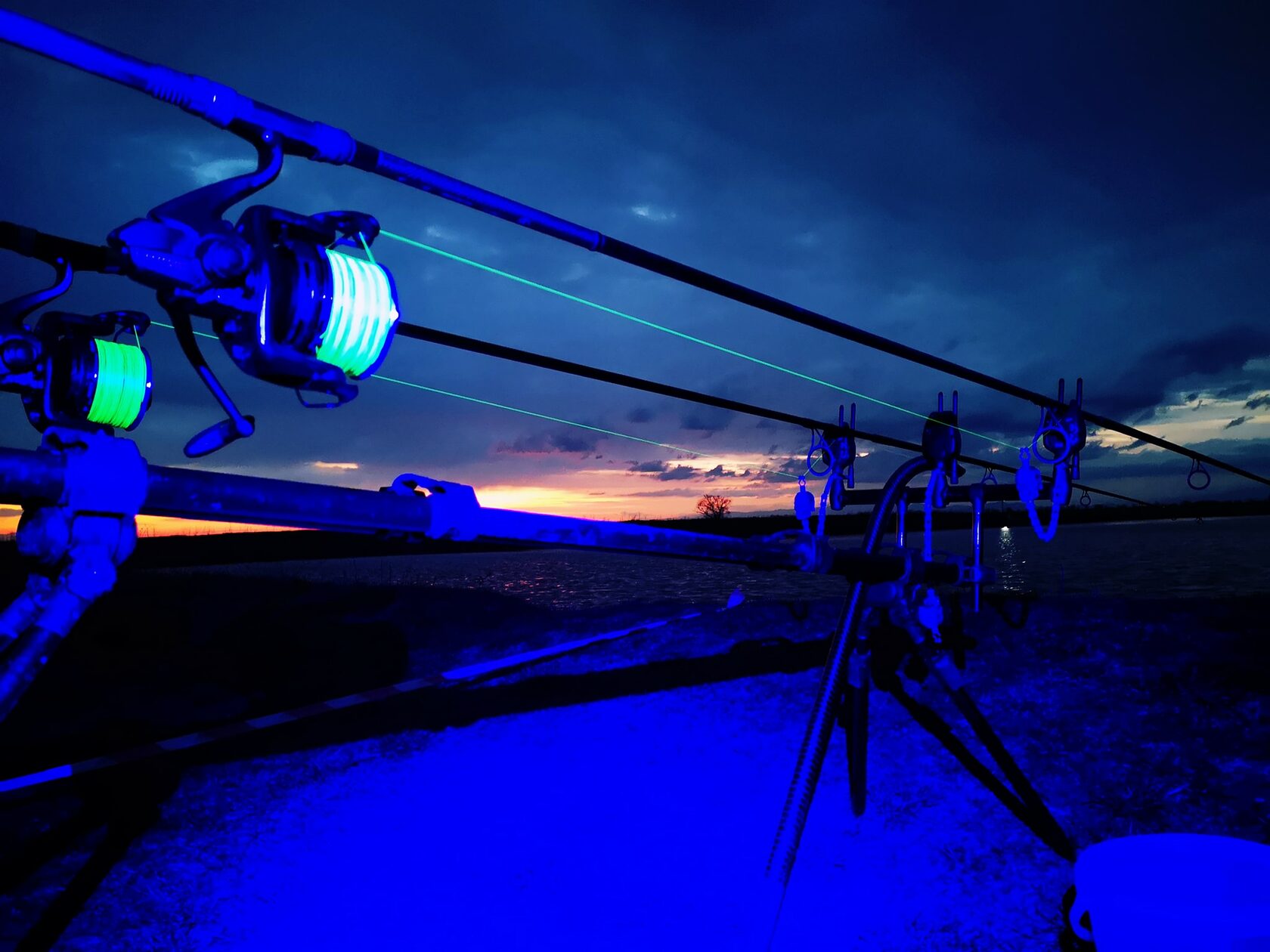 Angler using the Katran W/B 460 PRO headlamp