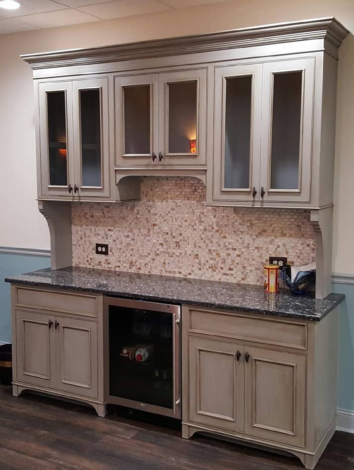 Commercial coffee bar with built-in mini fridge in distressed chalk paint