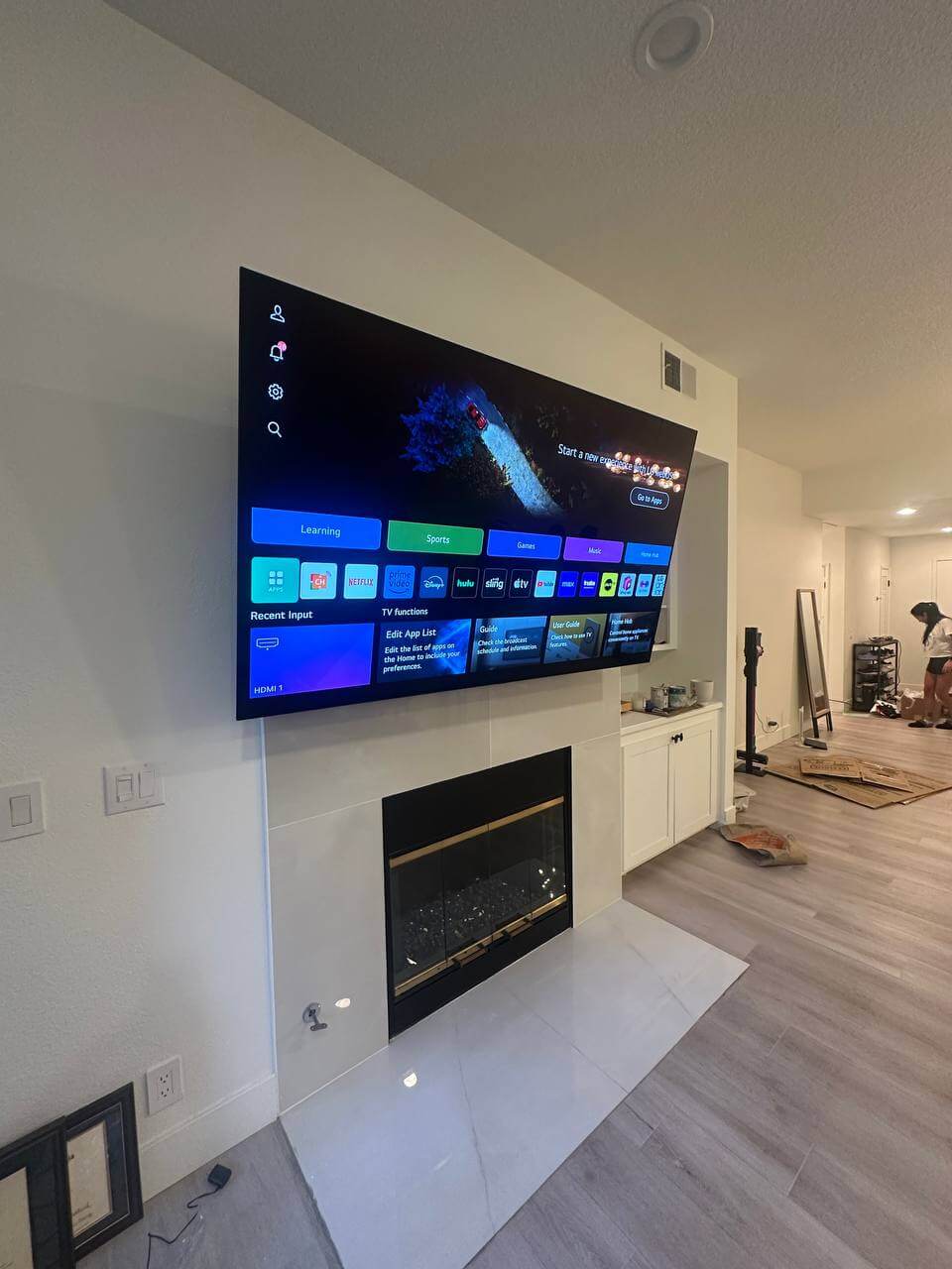TV mount above mantle