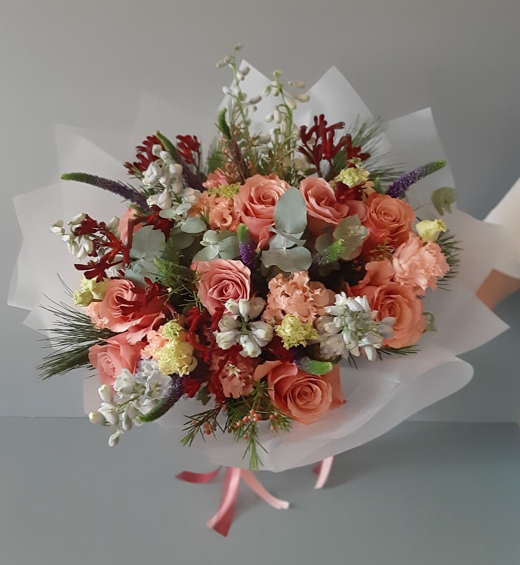 a delicate bouquet in peach shades
